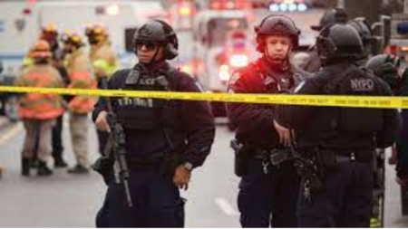 Gunman opens fire in Brooklyn subway, shot at least ten people.