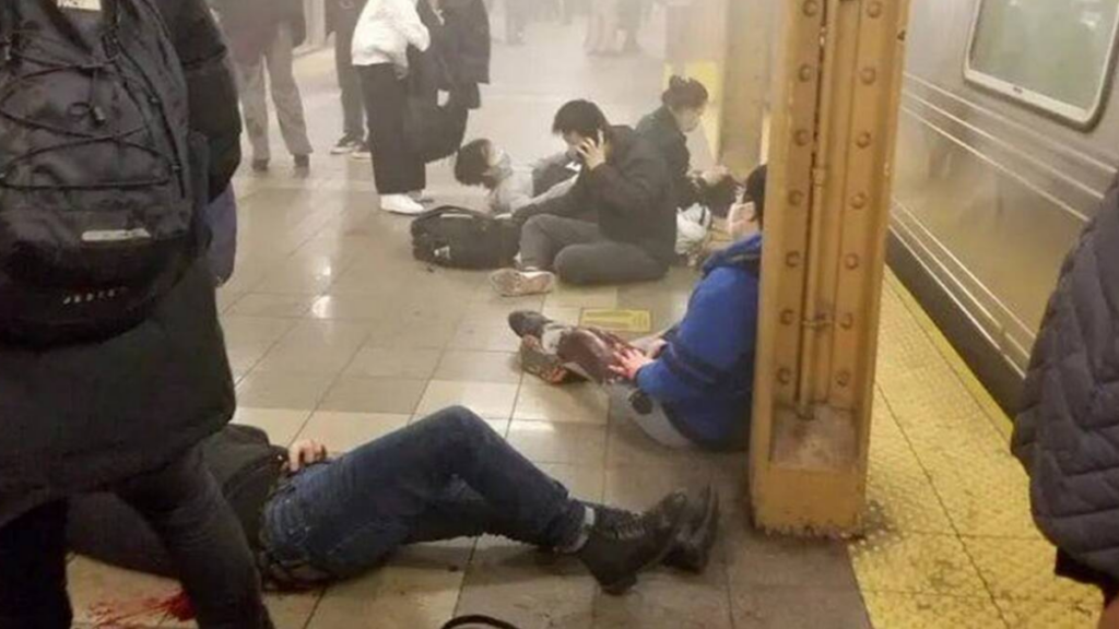 LIVE updates on the Brooklyn subway shooting 5 people were shot, 13 people were injured, and unexploded bombs were discovered at a train station in New York City.