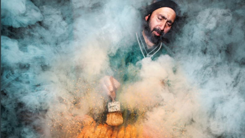 A photograph of a Kashmiri kebab vendor has won the International Food Photo Contest