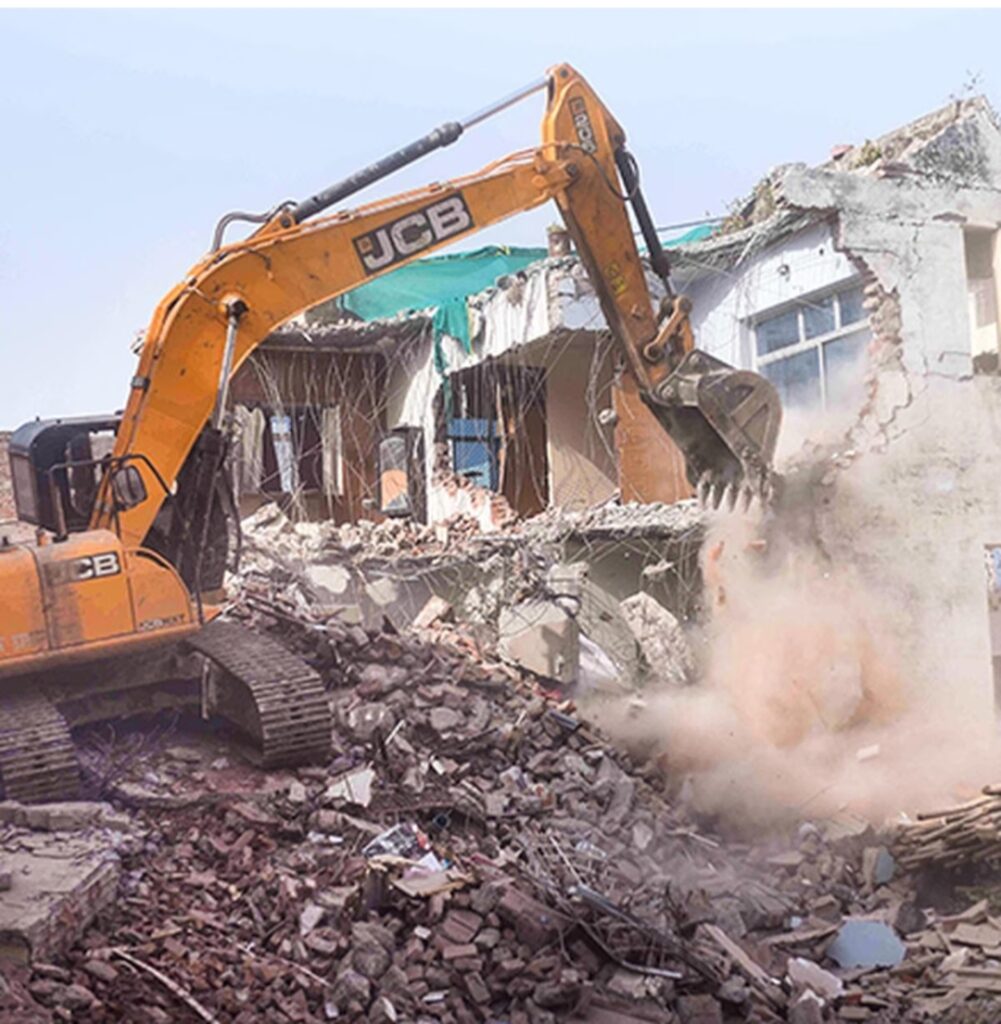 Bulldozer demolished the illegally constructed property of Javed Ahmad a local leader and alleged key planner of the protest against the remarks on Prophet Mohammed.