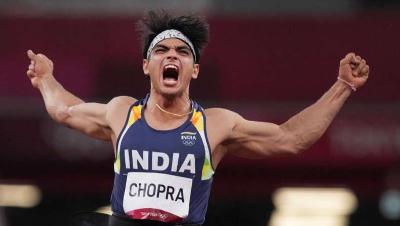Neeraj Chopra celebrating his victory during the Tokyo Olympics