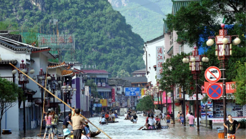 Flooding in South China has forced tens of thousands to flee