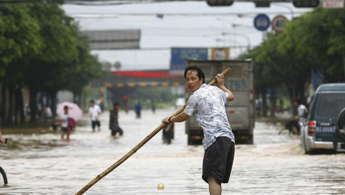 Flooding in South China has forced tens of thousands to flee