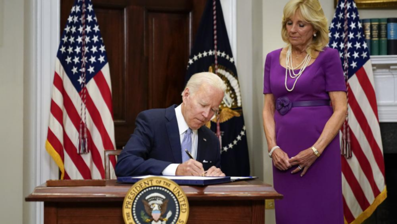 President Joe Biden signs the Bipartisan Safer Communities Act gun safety bill in the Roosevelt Room of the White House in Washington, June 25, 2022.