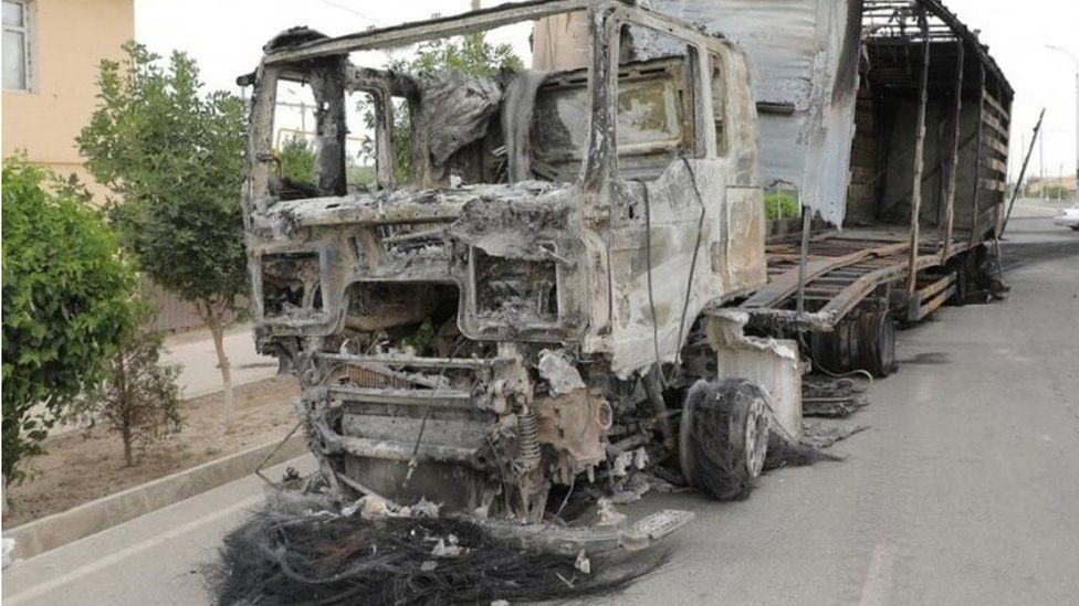 A lorry was set alight in the protests in Nukus, Uzbekistan.