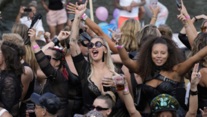 A huge crowd watches Amsterdam’s Pride canal Parade celebration