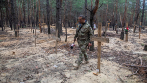 Bound bodies found in a mass grave in Izium after Russians forced out of the Ukrainian city