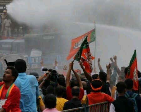 Tear gas and water hose being used to disperse the state cadre of BJP during the Nabanna Abhiyan.