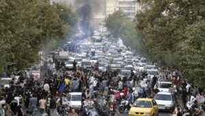 Iranian guard attacks militant group amid chaos