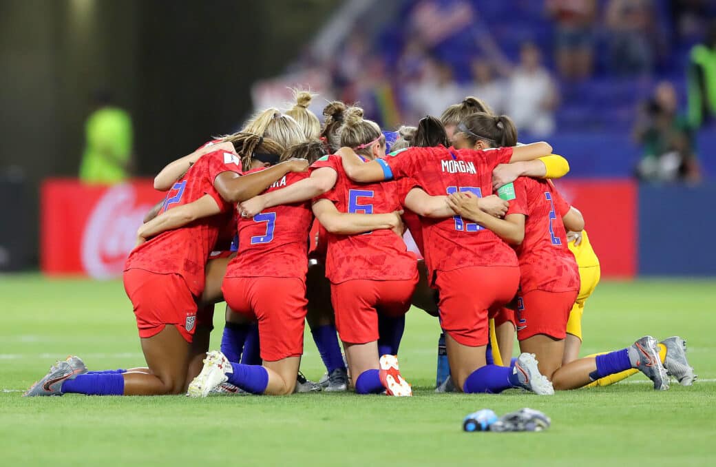 women soccer team huddle