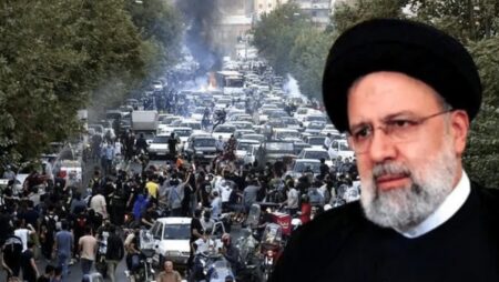 President Raisi of Iran warns anti-hijab protesters not to create "chaos" in the country.