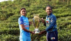 Two captains posing with the trophy(bcb)