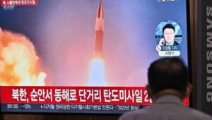 North Korea launches a missile over Japan, stopping trains and sending out a warning