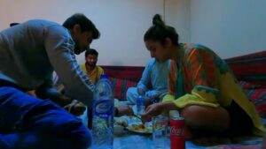 Shehnaaz Kaur Gill, demure, sits down on the ground alongside two companions while visiting UAE - Asiana Times