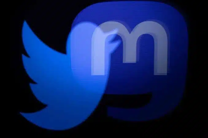 logos of twitter and mastodon