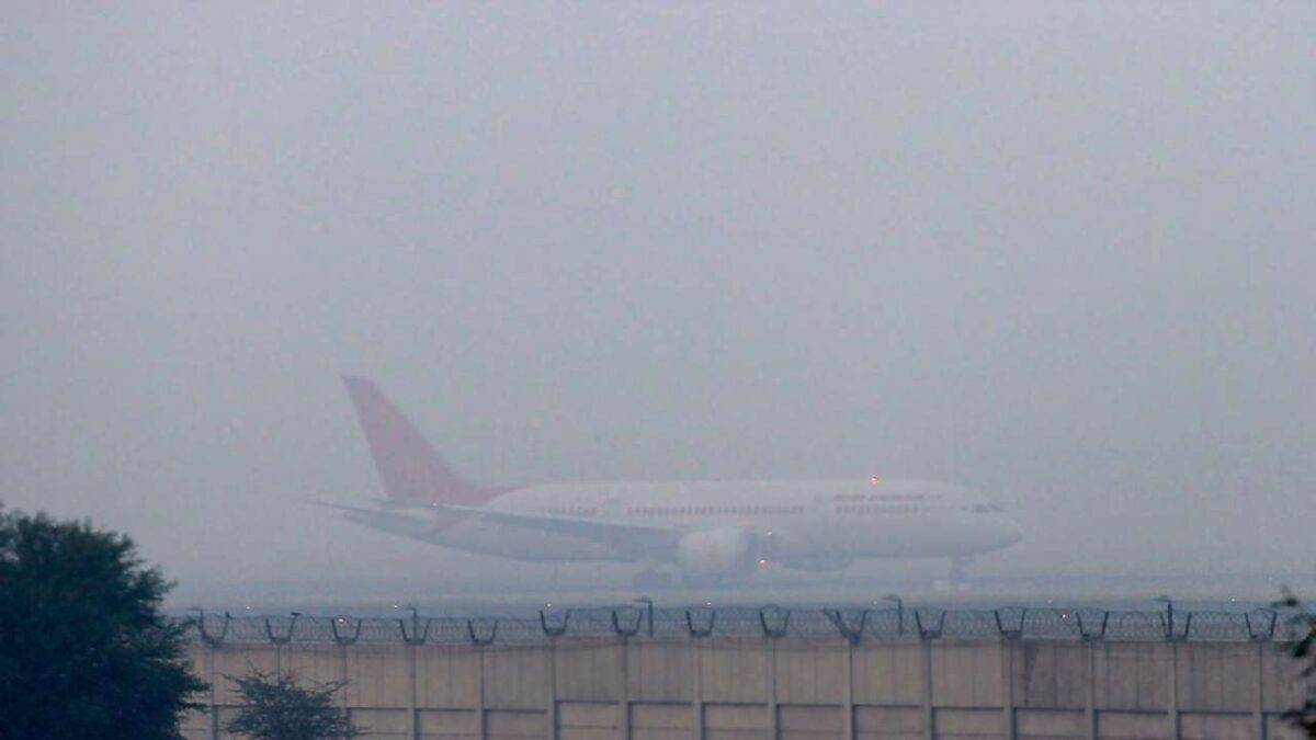 foggy view of aeroplane at Delhi Airport