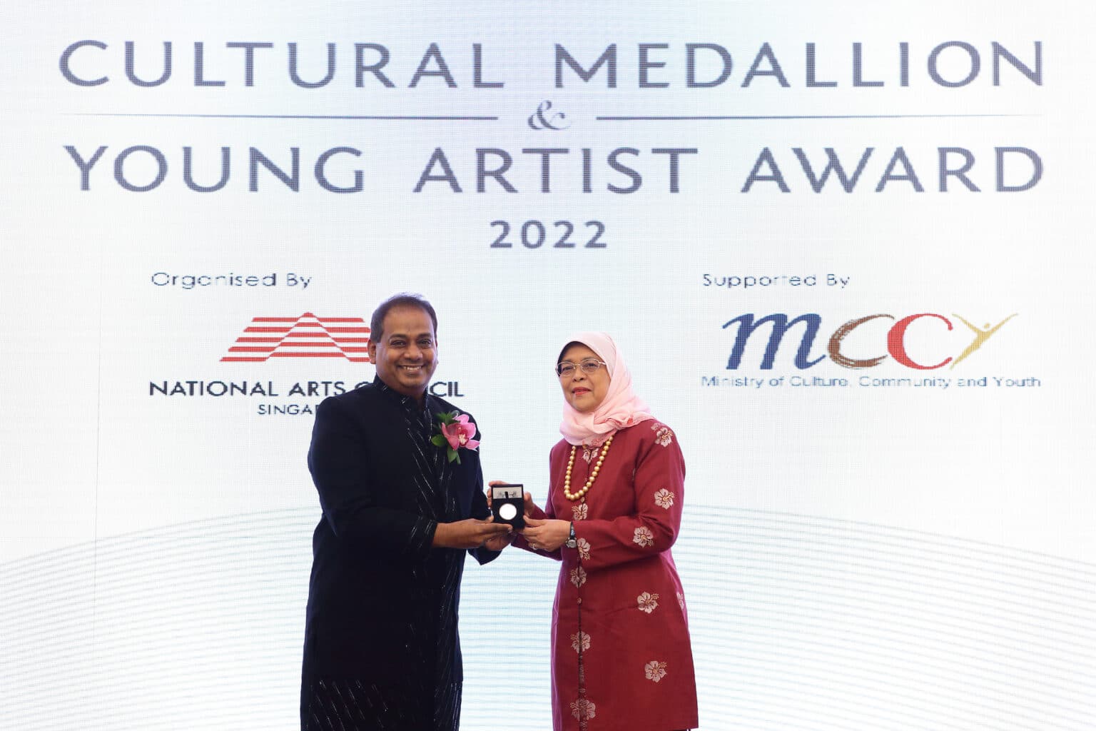 Aravinth Kumarasamy receiving Cultural Medallion