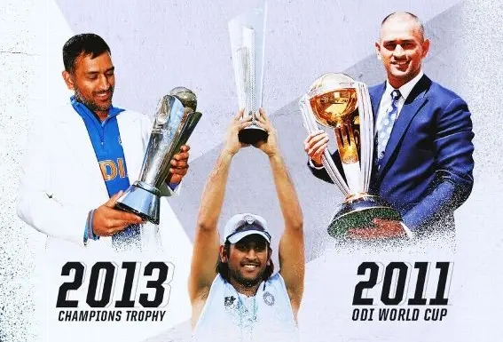 MS Dhoni holding trophies 