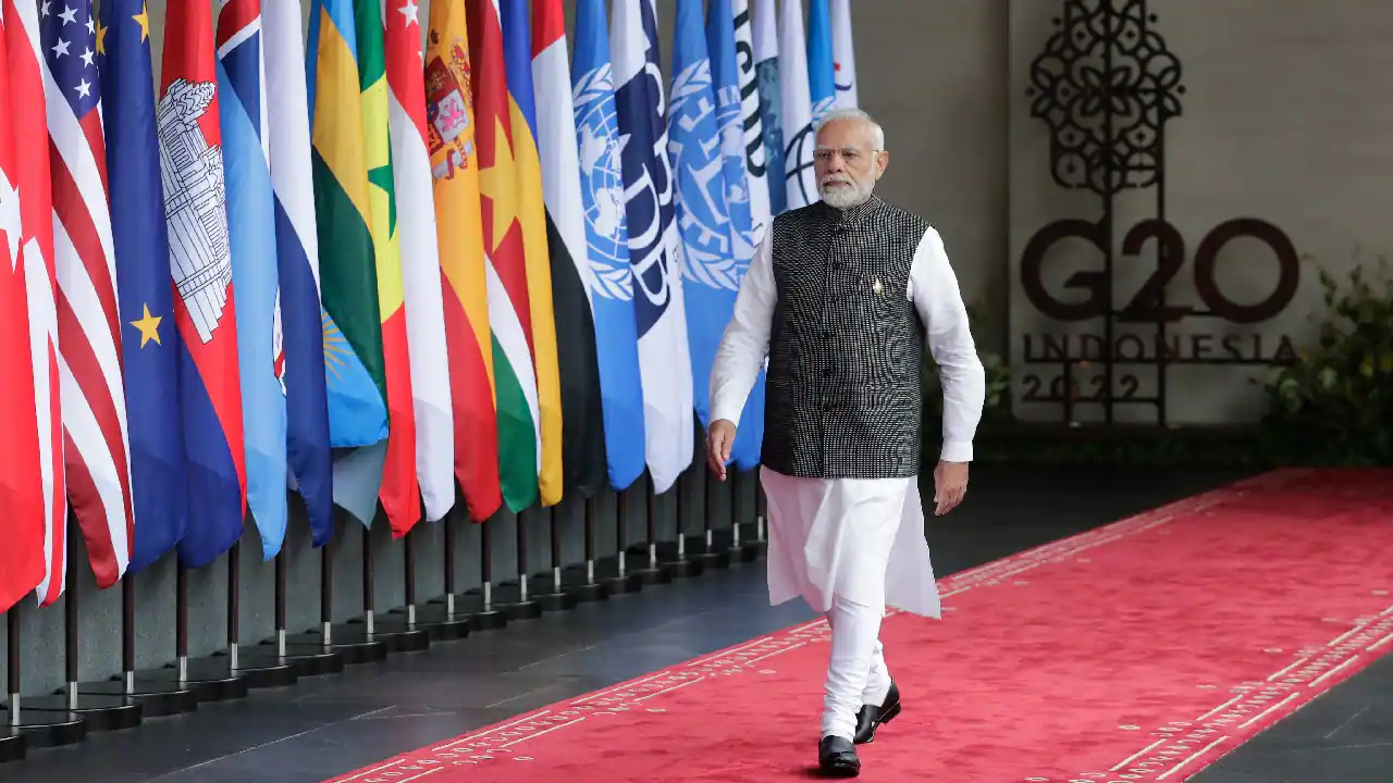 This is the picture of Prime Minister Narendra Modi  entering in the conference