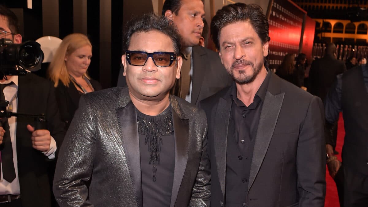 Shah Rukh Khan and AR Rahman posed at camera with black suit in Red Sea International Film Festival