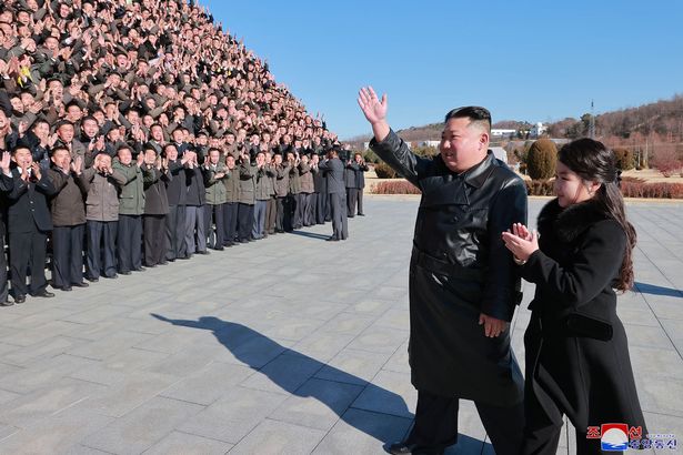 Kim Jong-un with daughter