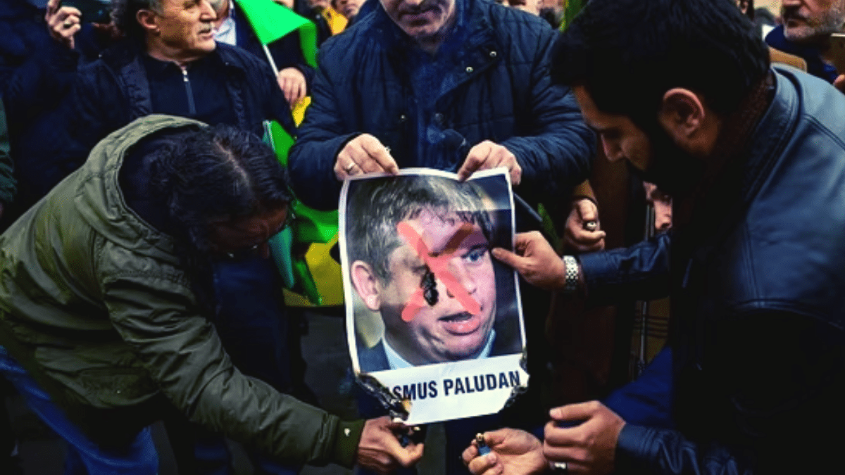 Turkish Muslims burning Rasmus Paludan's Poster in a protest in Sweden