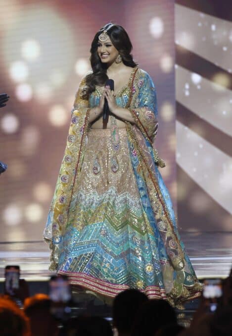 She wore a blue-and-pink lehenga further invigorated with vivid accents and sequined embellishments. 