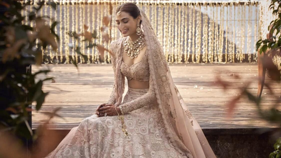 Athiya Shetty adorns a beautiful pink lehenga for her wedding