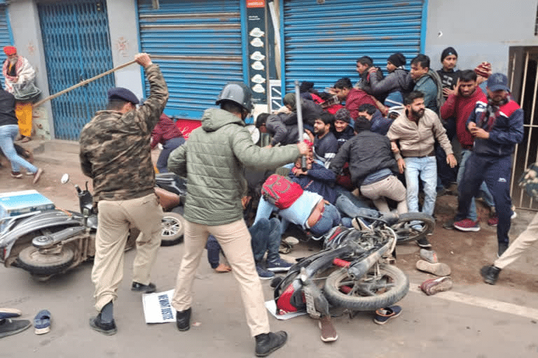 Paper leak protest lathi charge