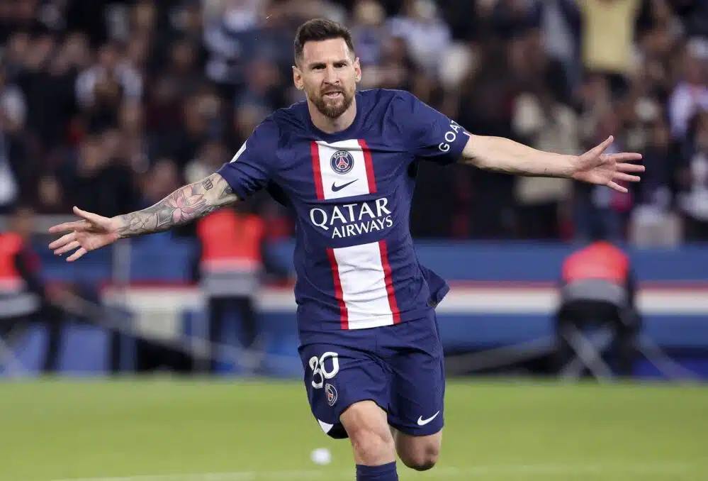 Lionel Messi celebrating after scoring a goal.