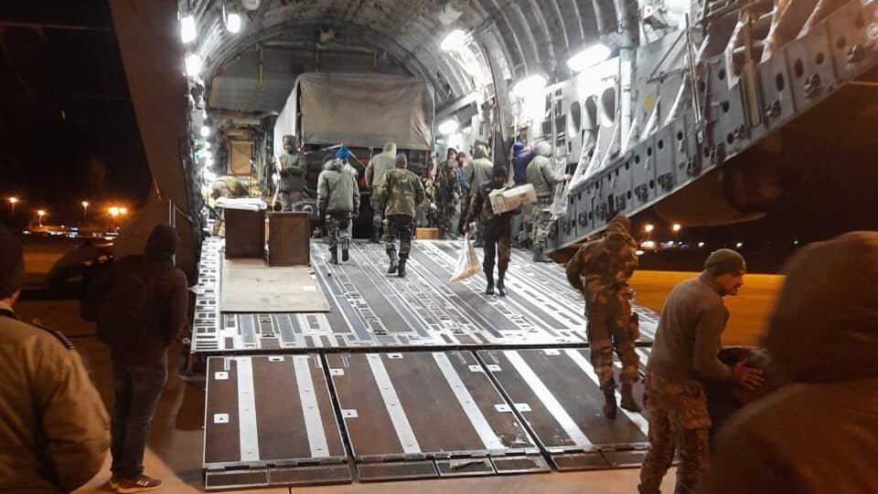 Indian Soldiers boarding supplies