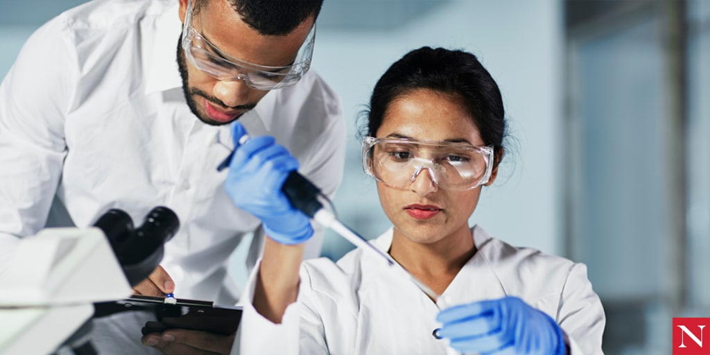 Doctors researching in laboratories. 