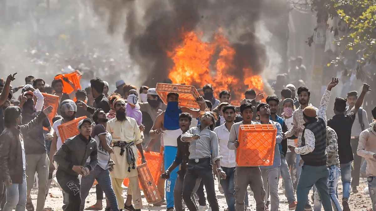 Protesters turn violent after Asaram Bapu was detained by the police.