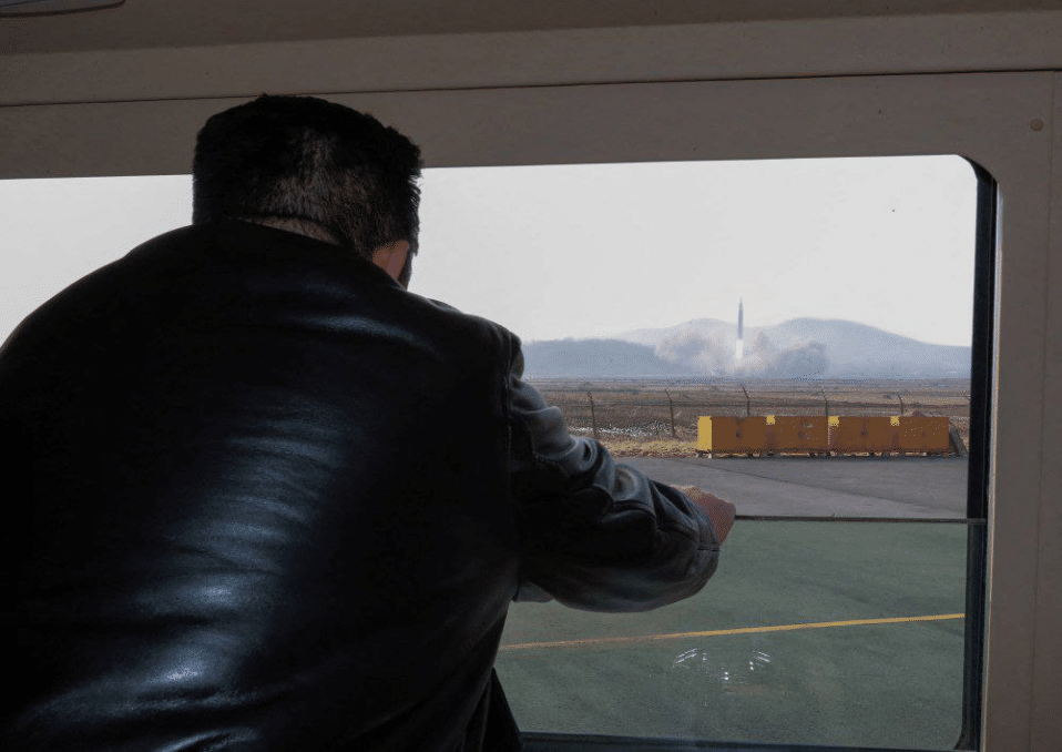 Kim Jong-Un watches the test of new type of ICBM developed by North Korea. (image source: KCNA via Reuters)