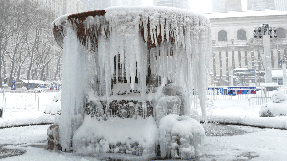 Pictures of Frozen Josephine Shaw Lowell Memorial Fountain in Bryant Park, New York.