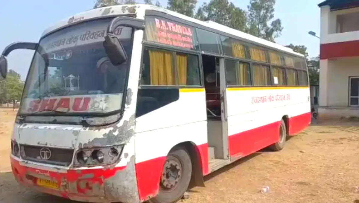 The bus carrying teachers and candidates who were found cheating for the government exam 