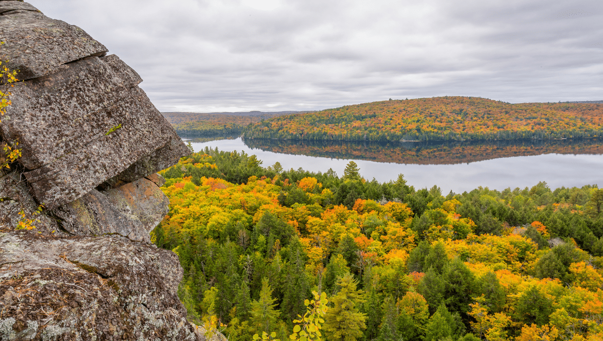 The Precambrian Rock Overlooking a Forested Lake 