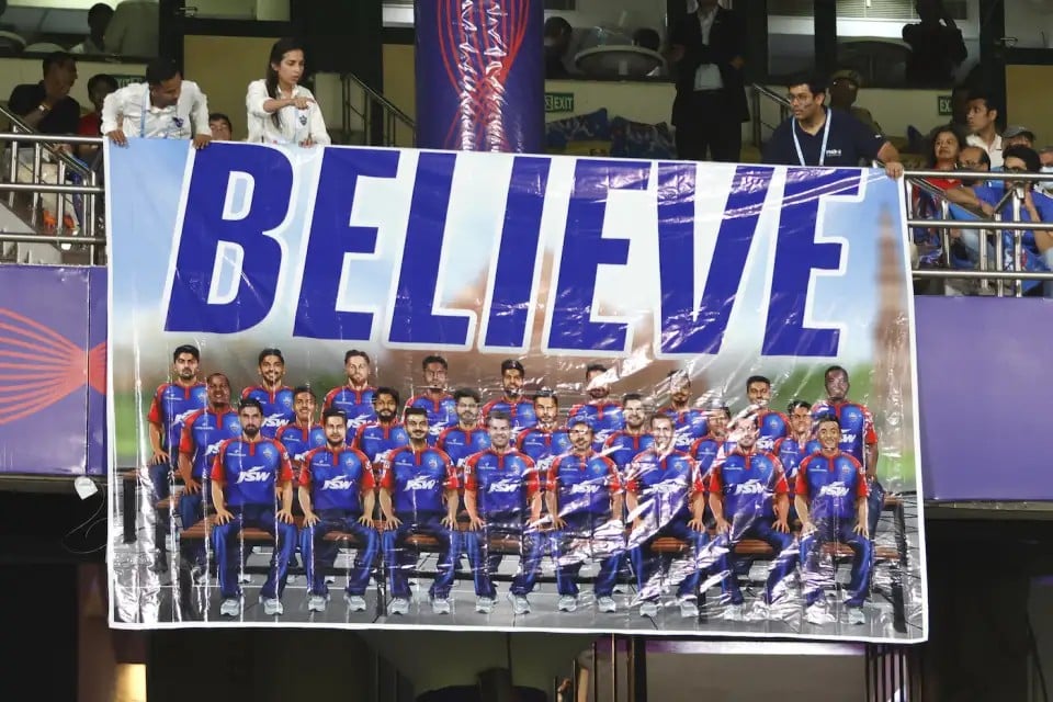 Fight ,Delhi Capitals fans showing love by sticking out banner written BELIEVE ahead of Mumbai Indian vs Delhi Capitals at Delhi