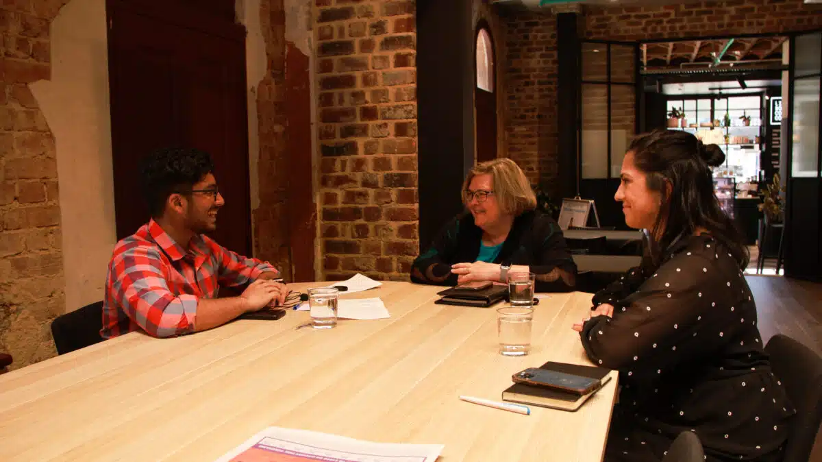 StudyPerth CEO Derryn Belford and Student Employability and Alumni Partnerships Manager Sonia McDonald in conversation with Haran Vinod