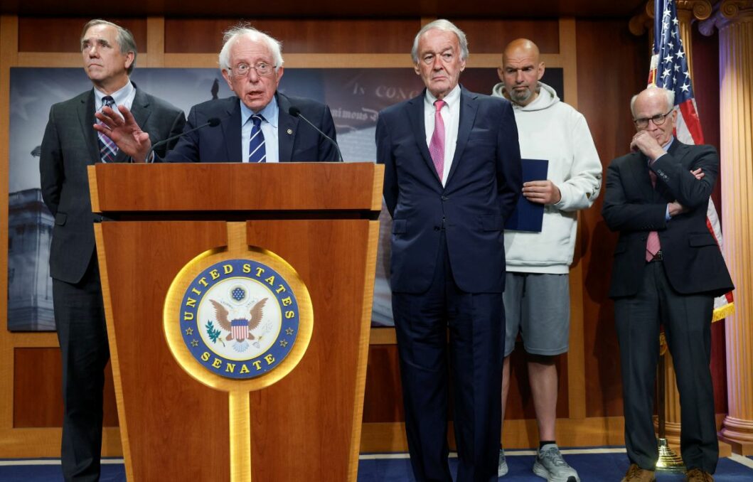Bernie Sanders giving a press conference on Debt Ceiling