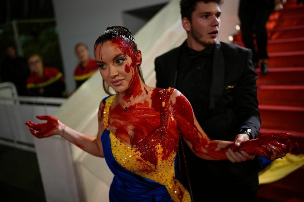 Ukrainian Protestor's Fake Blood Deluge Shocks Cannes 2024 - Asiana Times