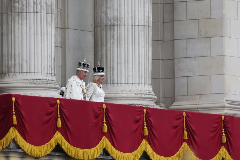 Waving the people from the palace balcony