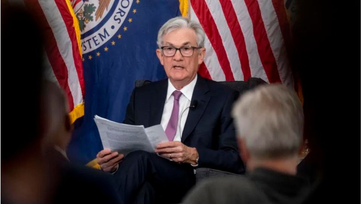 Federal Reserve Chair Jerome Powell giving a press conference at Thomas Laubach Research