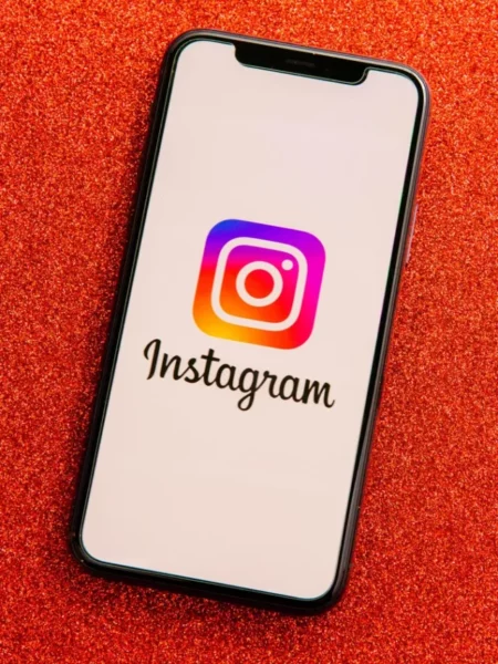 008-instagram-app-logo-on-phone-2021