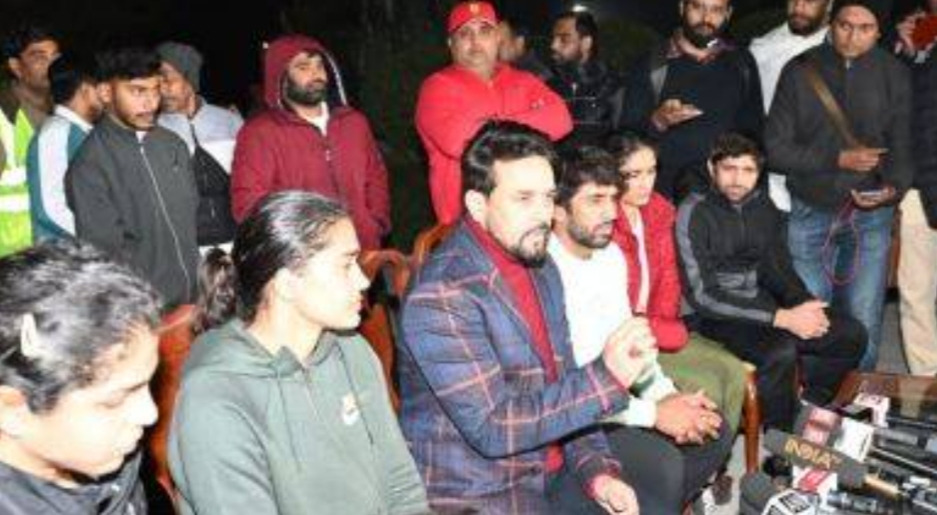 Union Spots minister Anurag Thakur with Wreslers