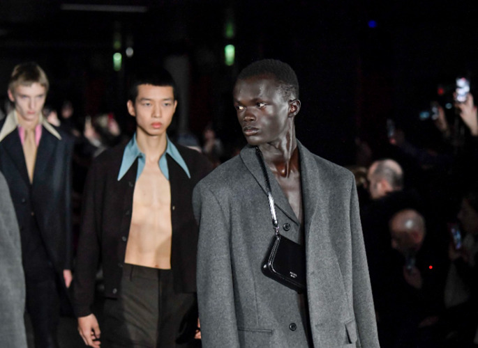 Stylish male models walking the runway at Milan Men's Fashion Week
