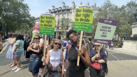 pro-choice protesters march through UK