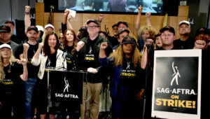 Members of the SAG-AFTRA standing in solidarity with the president, Fran Drescher.