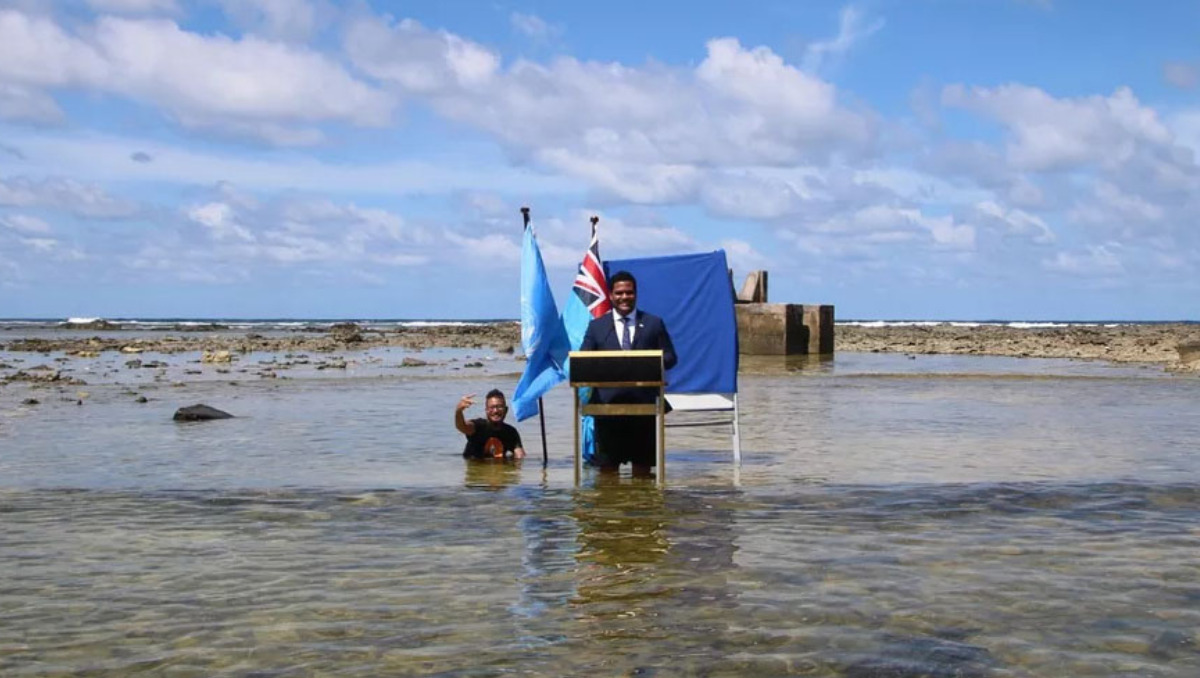 Tuvalu Minister Gave COP26 Speech knee-drop in the Ocean