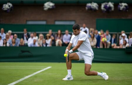 Novak Djokovic playing at Wimbledon
